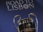 The UEFA Champions League trophy is displayed prior to the UEFA Champions League 2013/14 season quarter-finals draw at the UEFA headquarters, The House of European Football, on March 21, 2014