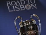 The UEFA Champions League trophy is displayed prior to the UEFA Champions League 2013/14 season quarter-finals draw at the UEFA headquarters, The House of European Football, on March 21, 2014