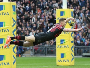 Saracens win to go top
