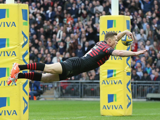 Saracens' Chris Ashton scores a try against Harlequins during the Aviva Premiership match on March 22, 2014
