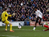 Daniel Sturridge of Liverpool scores his team's fifth goal during the Barclays Premier League match against Cardiff City on March 22, 2014