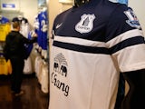 An Everton badge is seen on a replica playing shirt inside the club shop before the Barclays Premier League match between Everton and West Ham at Goodison Park on March 1, 2014