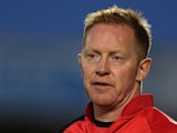 MK Dons assistant manager Gary Waddock looks on during the League Cup match against Northampton on August 6, 2013