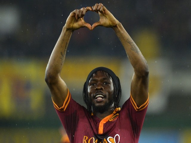 AS Roma's forward of Ivory Coast Gervinho celebrates after scoring during the Italian Serie A football match Chievo vs AS Roma on March 22, 2014 