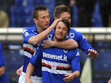 Gianluca Sansone (2nd R) of UC Sampdoria celebrates after scoring the opening goal during the Serie A match against Hellas Verona on March 23, 2014
