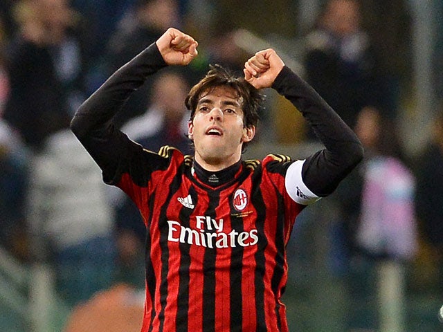 Milan's Kaka celebrates after scoring the opening goal against Lazio in the Serie A march on March 23, 2014