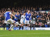 Leighton Baines of Everton scores from the penalty spot during the Barclays Premier League match between Everton and Swansea City at Goodison Park on March 22, 2014