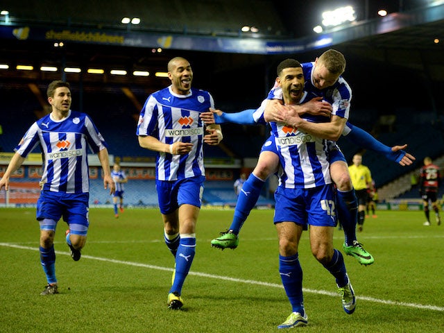 Leon Best of Sheffield Wednesday celebrates scoring to make it 2-0 with team mates during the Sky Bet Championship match between Sheffield Wednesday and QPR on March 18, 2014
