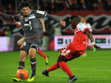 Valenciennes' Majeed Waris scores a goal during the French L1 football match against Ajaccio March 22, 2014