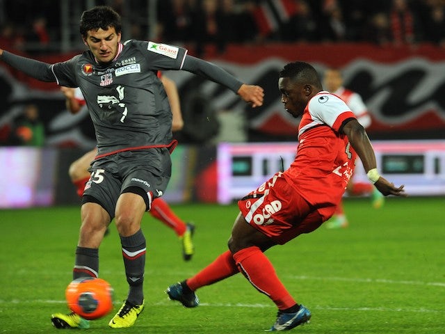 Valenciennes' Majeed Waris scores a goal during the French L1 football match against Ajaccio March 22, 2014