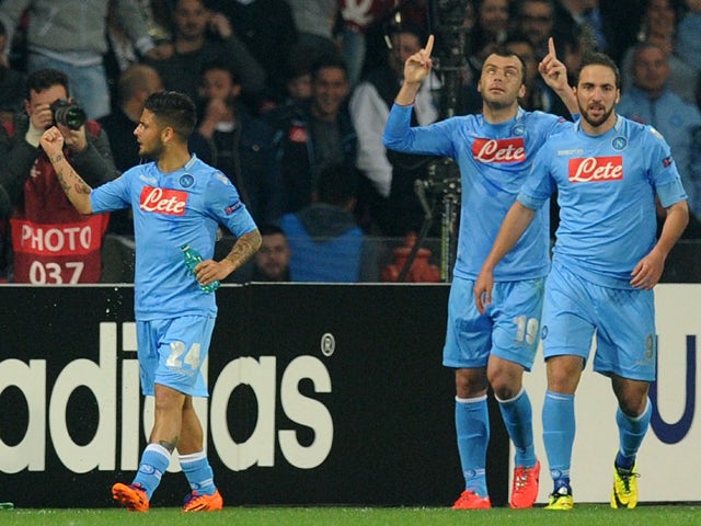 Goran Pandev of SSC Napoli celebrates after scoring the opening goal during the UEFA Europa League Round of 16 second leg match between SSC Napoli and FC Porto at Stadio San Paolo on March 20, 2014