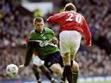 Ole Gunnar Solskjaer, then of Manchester United, scores against Liverpool on March 04, 2000.