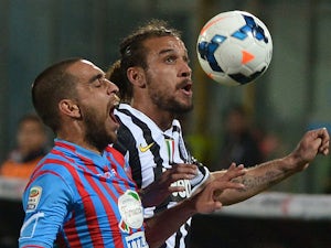 Juventus edge past 10-man Catania
