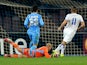 Nabil Ghilas of FC Porto scores their first goal during the UEFA Europa League Round of 16 match between SSC Napoli and FC Porto at Stadio San Paolo on March 20, 2014