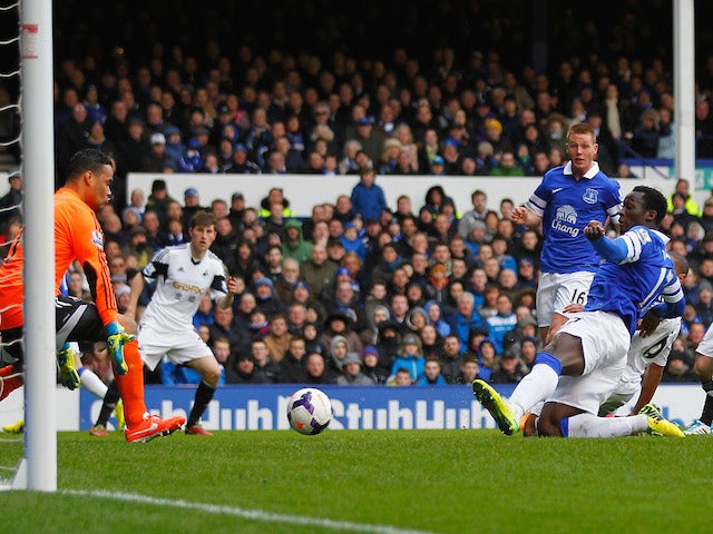 Romelu Lukaku of Everton scores his team's second goal during the Barclays Premier League match between Everton and Swansea City at Goodison Park on March 22, 2014