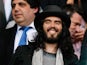 Comic actor Russell Brand enjoys the atmosphere during the nPower Championship Playoff Semi Final 2nd Leg between West Ham United and Cardiff City at the Boleyn Ground on May 7, 2012