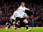 Wayne Rooney of Manchester United scores the opening goal with a long range shot during the Barclays Premier League match between West Ham United and Manchester United at Boleyn Ground on March 22, 2014