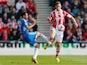 Ahmed Elmohamady of Hull City challenges Marko Arnautovic of Stoke City during the Barclays Premier League match on March 29, 2014