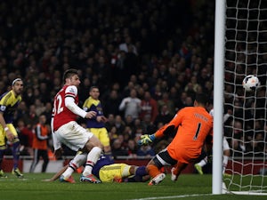 Flamini own goal denies Arsenal