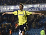 Nicola Zigic of Birmingham celebrates after scoring their third goal of the game during the Sky Bet Championship match between Millwall and Birmingham City at The Den on March 25, 2014