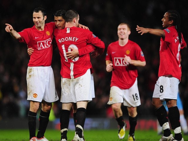 Manchester United players celebrate Cristiano Ronaldo's goal against Aston Villa on March 29, 2008.