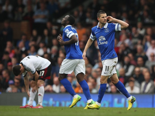 Kevin Mirallas of Everton gestures to fans after scoring his team's second goal during the Barclays Premier League match between Fulham and Everton at Craven Cottage on March 30, 2014