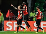 Rennes' Polish forward Kamil Grosicki (C) celebrates with teammates after scoring a goal during the French Cup quarter final football match between Rennes and Lille on March 27, 2014