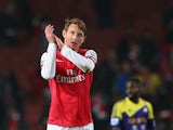 Kim Kallstrom of Arsenal looks on during the Barclays Premier League match between Arsenal and Swansea City at Emirates Stadium on March 25, 2014