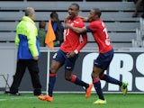 Lille's Ivorian forward Salomon Kalou celebrates after scoring a goal during the French L1 football match Lille vs Gingamp on March 30, 2014