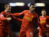 Daniel Sturridge of Liverpool celebrates scoring the second goal with team-mate Jordan Henderson during the Barclays Premier League match between Liverpool and Sunderland at Anfield on March 26, 2014
