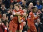 Liverpool's English midfielder Steven Gerrard celebrates scoring the opening goal from a freekick with Liverpool's Uruguayan striker Luis Suarez during the English Premier League football match between Liverpool and Sunderland at Anfield in Liverpool, nor