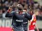 Lorient's Cameroonian forward Vincent Aboubakar celebrates after scoring a goal during the French Ligue 1 football match between Stade de Reims and FC Lorient, on March 29, 2014