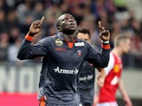 Lorient's Cameroonian forward Vincent Aboubakar celebrates after scoring a goal during the French Ligue 1 football match between Stade de Reims and FC Lorient, on March 29, 2014