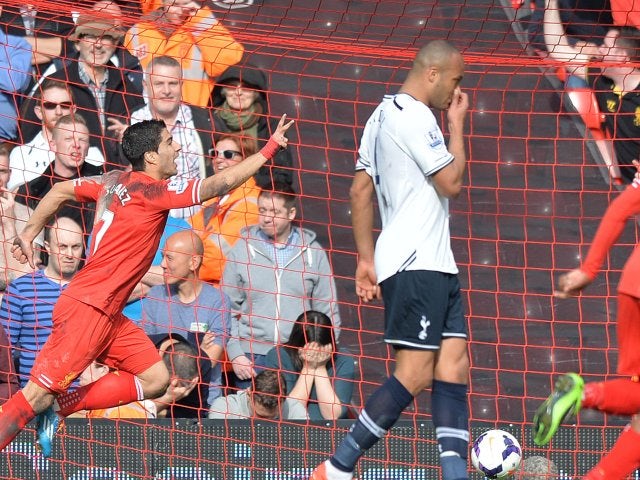 Liverpool's Luis Suarez celebrates scoring against Tottenham Hotspur on March 30, 2014.
