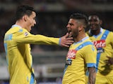 Jose Callejon of Napoli celebrates the seocnd goal wth his team-mate Lorenzo Insigne during the Serie A match between Calcio Catania and SSC Napoli at Stadio Angelo Massimino on March 26, 2014