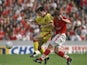 Neil Redfearn of Barnsley challenges Oyvind Leonhardsen of Liverpool during the FA Carling Premiership match at Oakwell on March 28, 1998