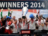 Peterborough captain Tommy Rowe lifts the trophy after his team won the Johnstone's Paint Trophy Final between Chesterfield and Peterborough United at Wembley Stadium on March 30, 2014