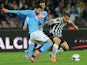 Raul Albiol of Napoli and Pablo Osvaldo of Juventus in action during the Serie A match between SSC Napoli and Juventus at Stadio San Paolo on March 30, 2014