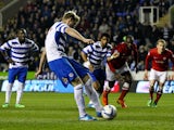 Pavel Pogrebnyak of Reading scores his team's first goal of the game during the Sky Bet Championship match between Reading and Barnsley at Madejski Stadium on March 25, 2014