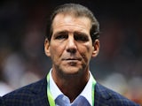 Baltimore Ravens team owner Steve Bisciotti looks on from the field against the San Francisco 49ers during Super Bowl XLVII at the Mercedes-Benz Superdome on February 3, 2013
