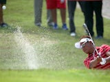 Thongchai Jaidee of Team Asia in actions in the foursome matches against Team Europe during day two of the EurAsia Cup at Glenmarie G&CC on March 28, 2014