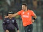 England bowler Tim Bresnan celebrates after taking the wicket of Indian batsman Shikhar Dhawan during the ICC World Twenty20 tournament's warm up cricket match between England and India at The Sher-e-Bangla National Cricket Stadium in Dhaka on March 19, 2