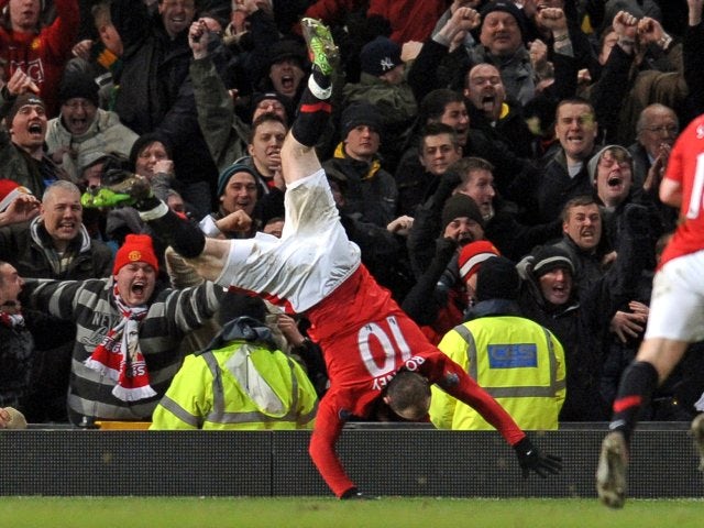 Wayne Rooney celebrates scoring for Manchester United against Manchester City on January 27, 2010.