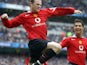 Wayne Rooney celebrates scoring for Manchester United against Manchester City on February 13, 2005.