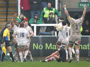 Josh Drauniniu of Worcester celebrates with team mates after scoring a try during the Aviva Premiership match between Newcastle Falcons and Worcester Warriors at Kingston Park on March 30, 2014 