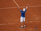 Andreas Seppi of Italy celebrates match point during the fifth and decisive rubber against James Ward of Great Britain during day three of the Davis Cup World Group Quarter Final match between Italy and Great Britain at Tennis Club Napoli on April 6, 2014