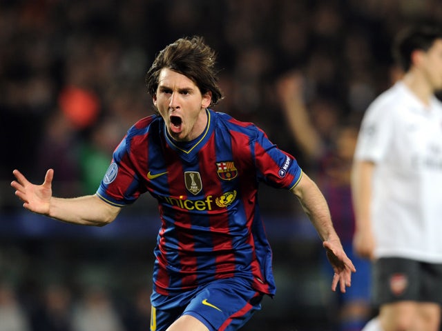 Barcelona's Argentinian forward Lionel Messi celebrates scoring against Arsenal during the Champions League quarter-final second-leg match at Camp Nou stadium in Barcelona on April 6, 2010