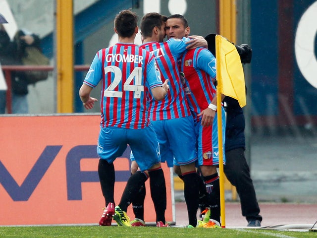 Gonzalo Bergessio of Catania celebrates after scoring the opening goal during the Serie A match between Calcio Catania and Torino FC at Stadio Angelo Massimino on April 6, 2014