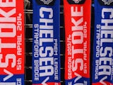 Matchday scarves are sold ahead of the Barclays Premier League match between Chelsea and Stoke City at Stamford Bridge on April 5, 2014
