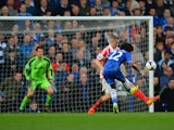 Willian of Chelsea scores their third goal during the Barclays Premier League match between Chelsea and Stoke City at Stamford Bridge on April 5, 2014